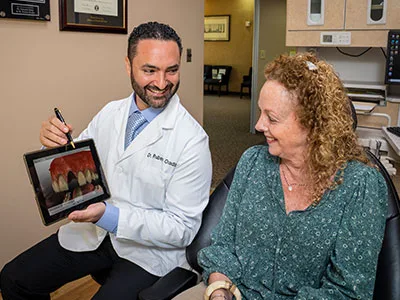 Dr. Ovadia in a consultation with a patient.