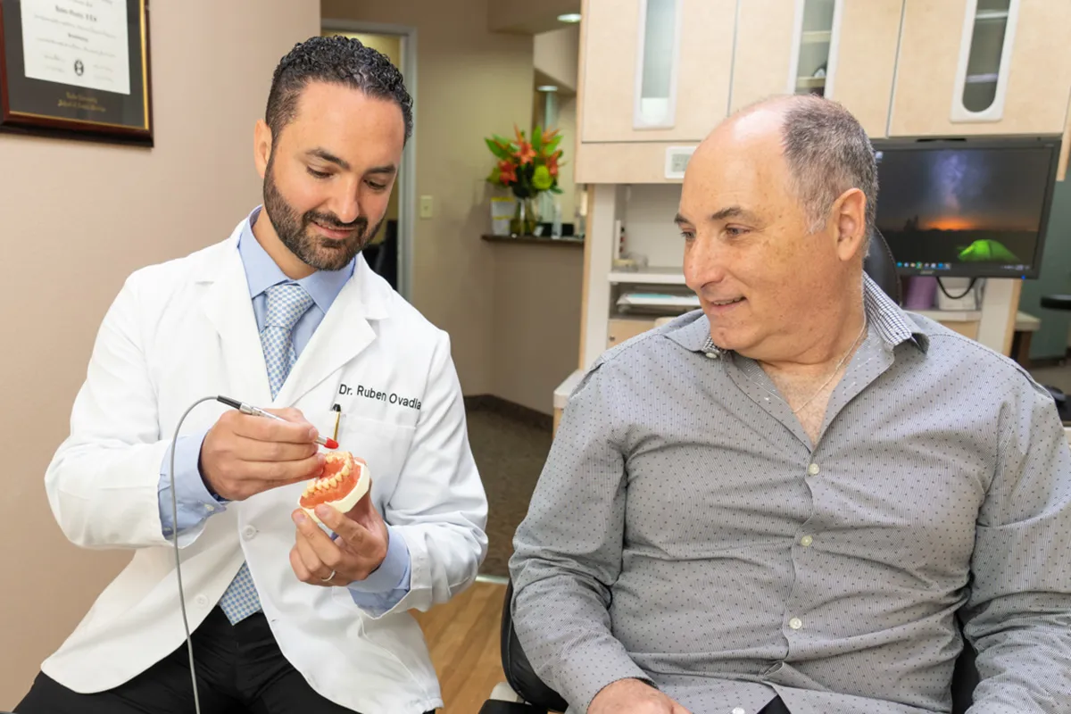 Dr. Ovadia and a patient discuss treatment