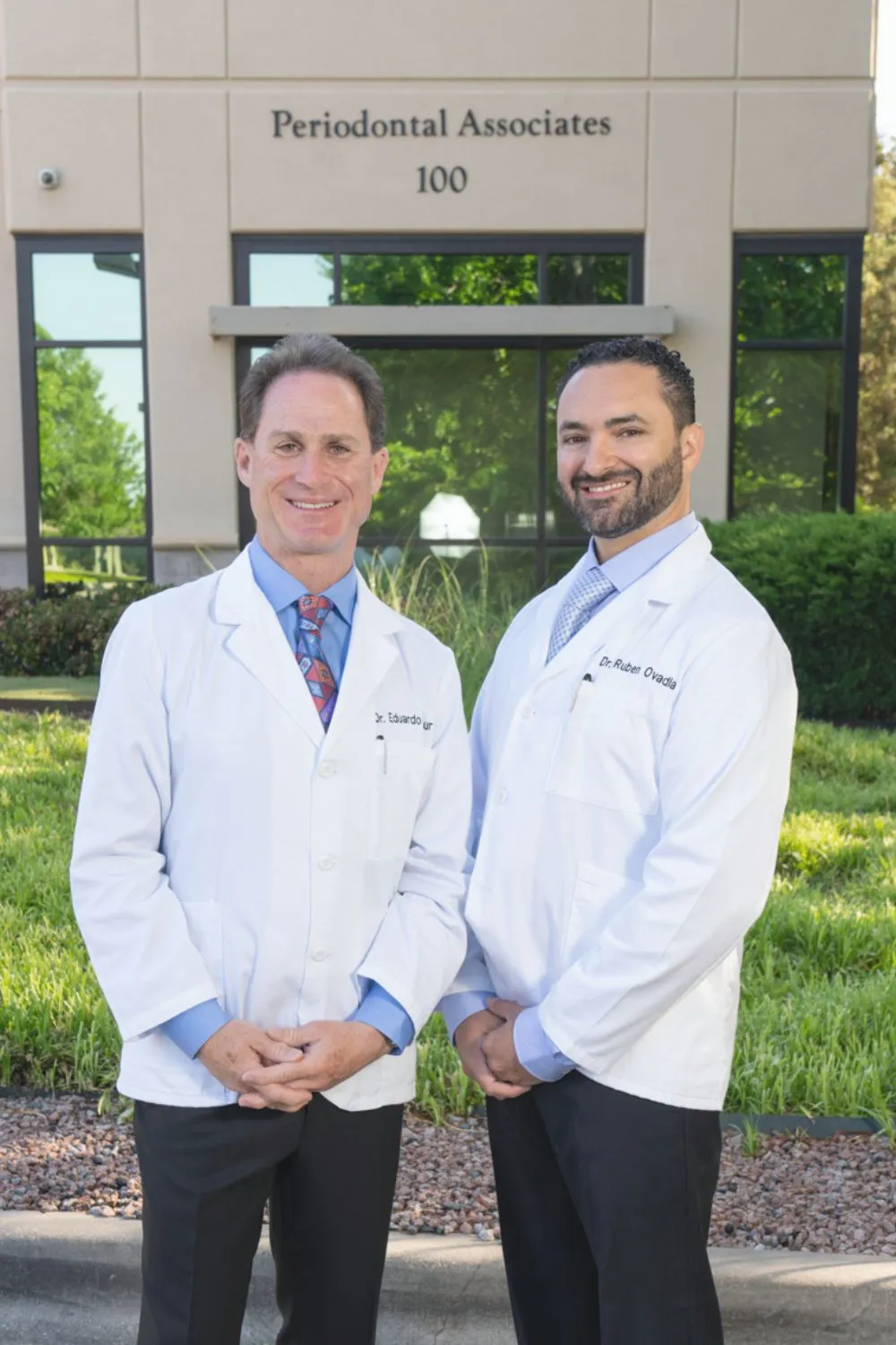 Dr. Tanur & Ovadia outside their dental office